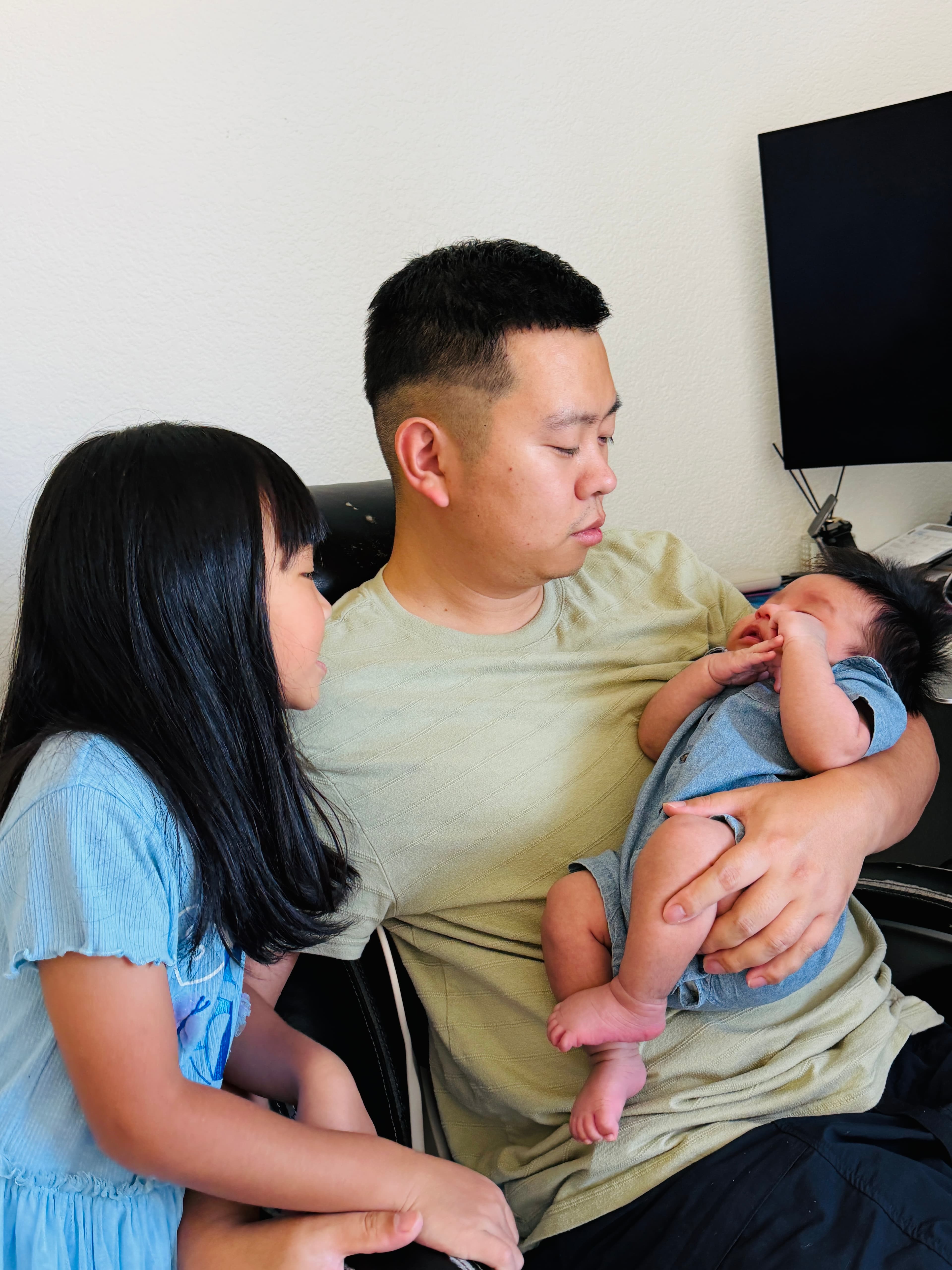 HENG WAN with two kids